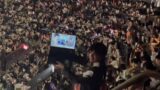 Zhongli Doing Gacha Pull in Genshin Impact Concert